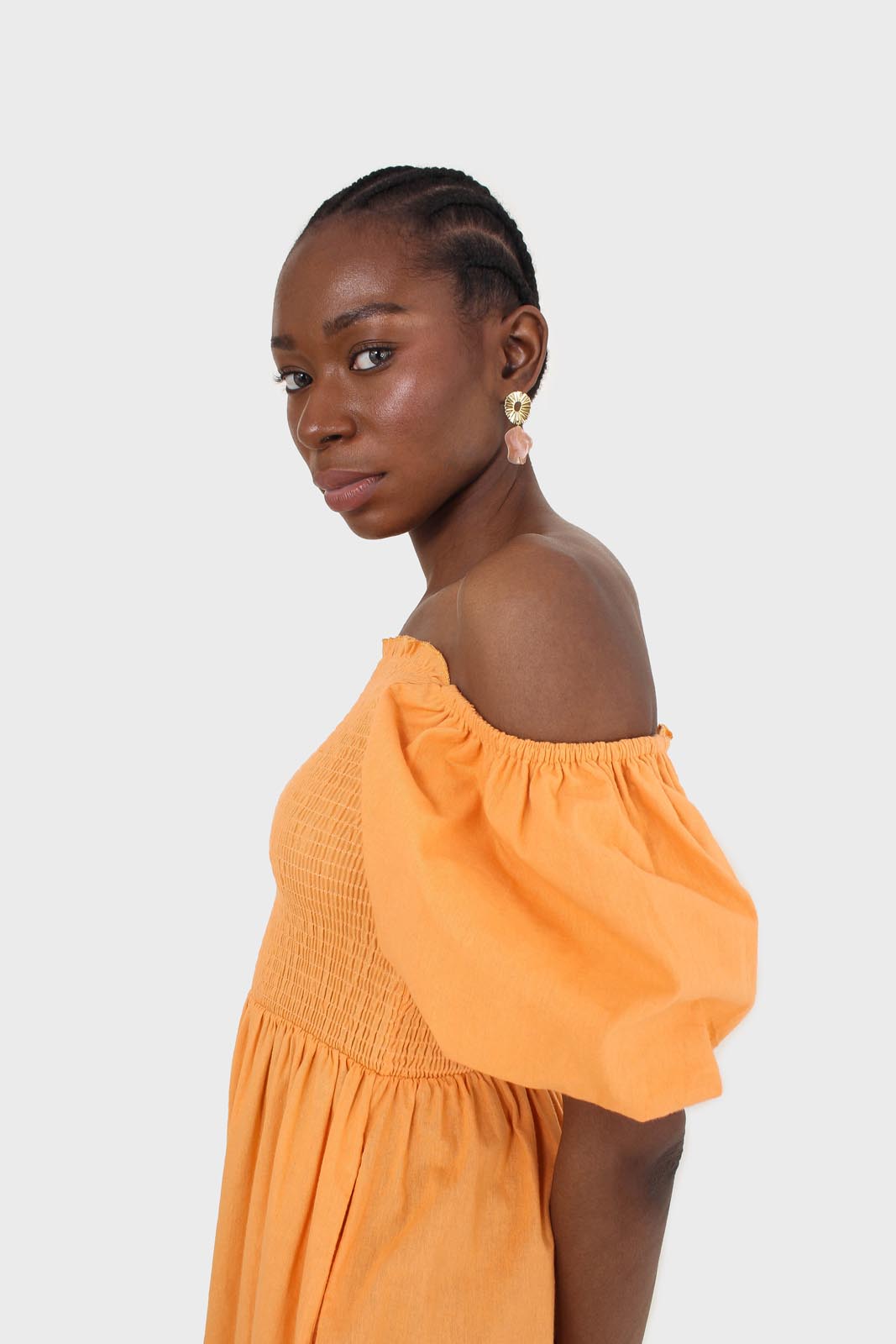 Orange short sleeved ruched bodice jumpsuit