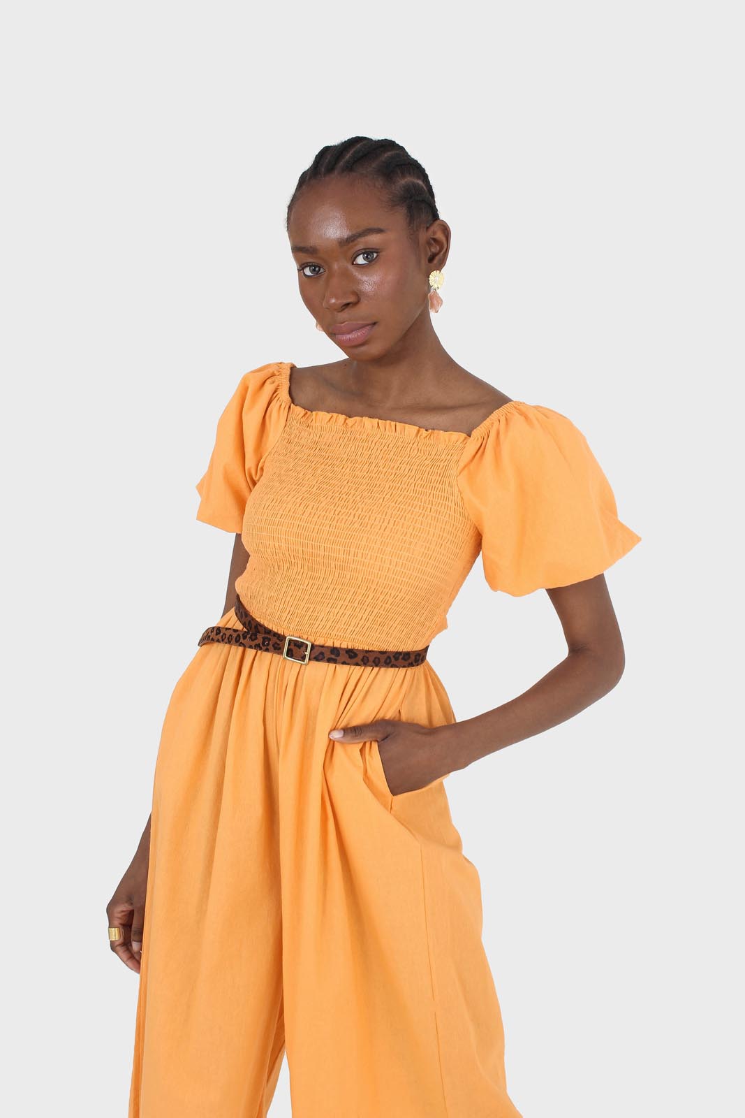 Orange short sleeved ruched bodice jumpsuit