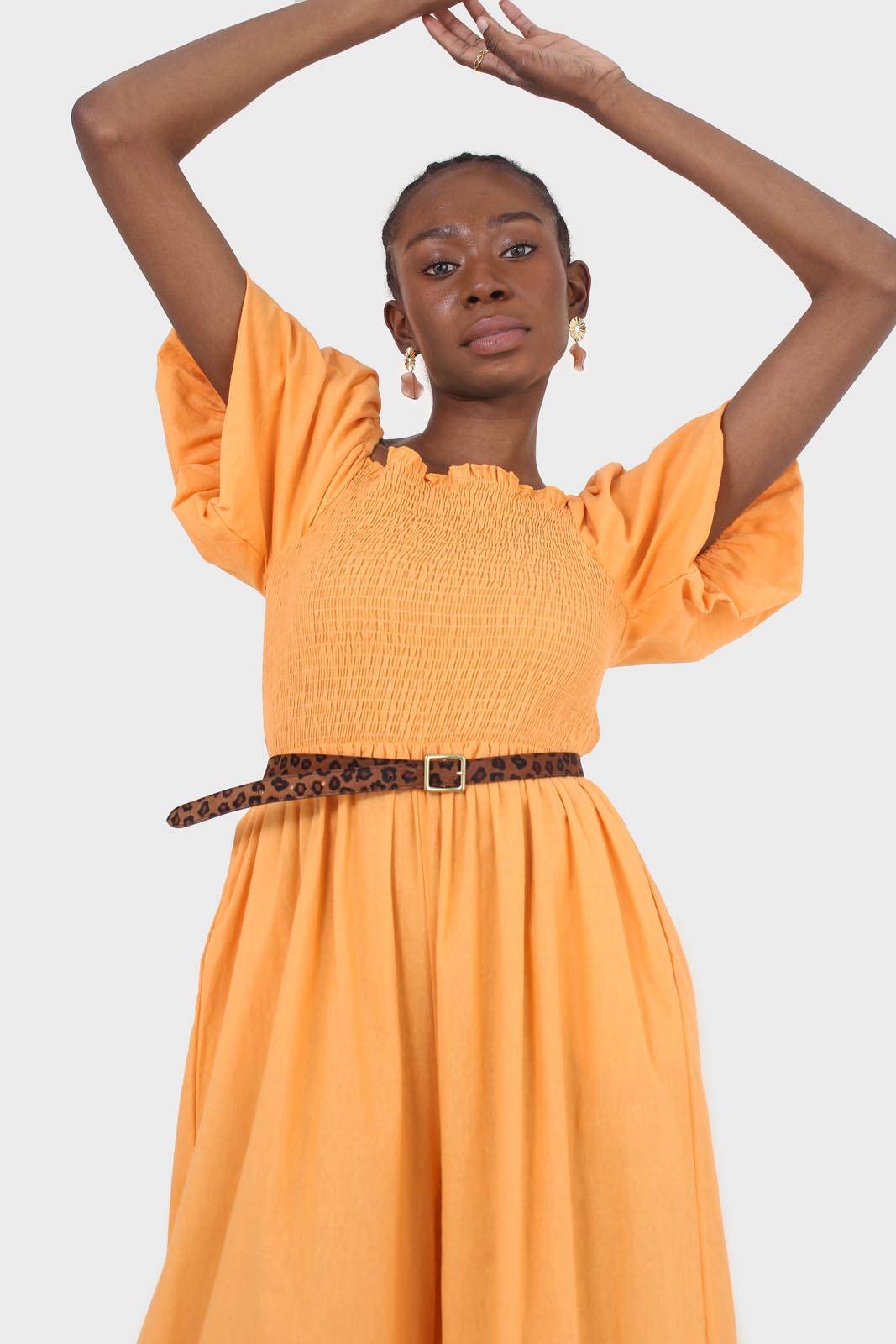 Orange short sleeved ruched bodice jumpsuit