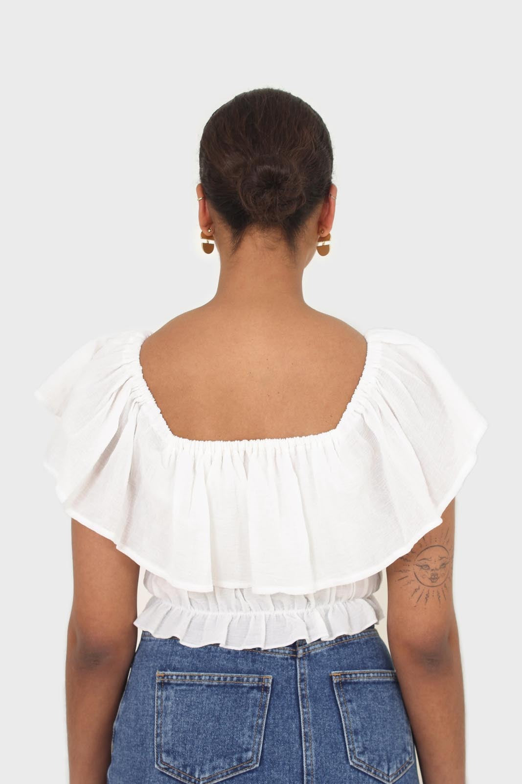 Ivory off shoulder large tier peasant top