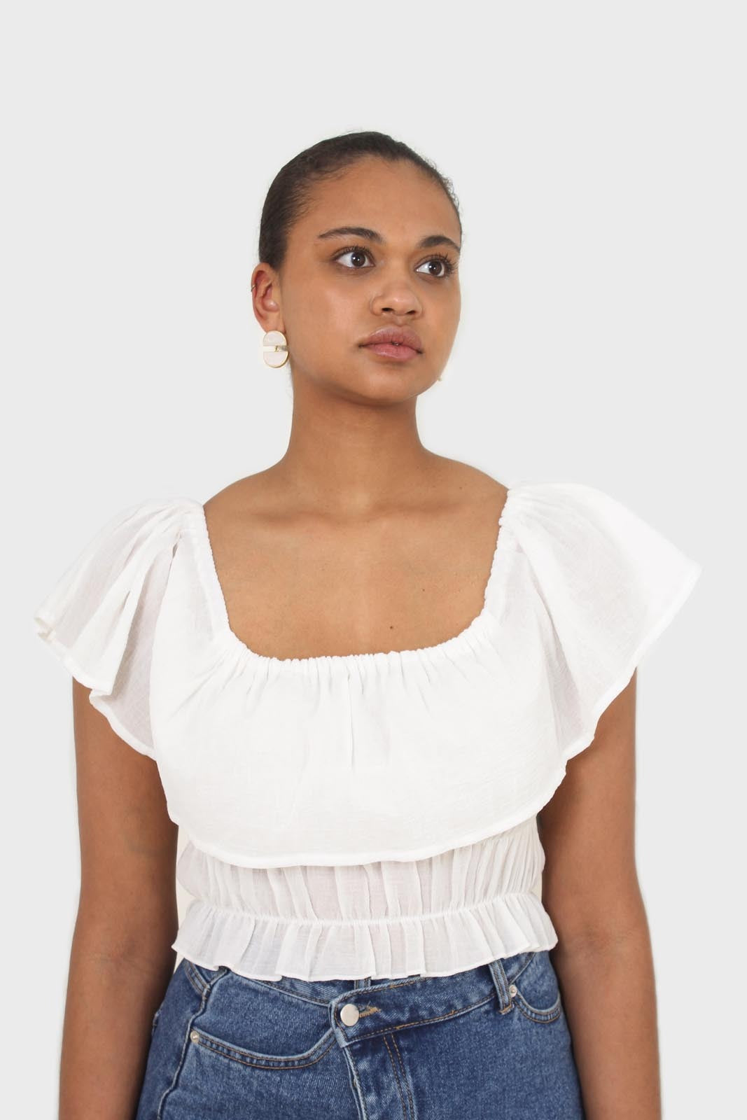 Ivory off shoulder large tier peasant top
