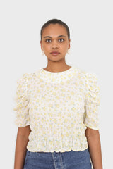 Yellow floral smocked short sleeved blouse