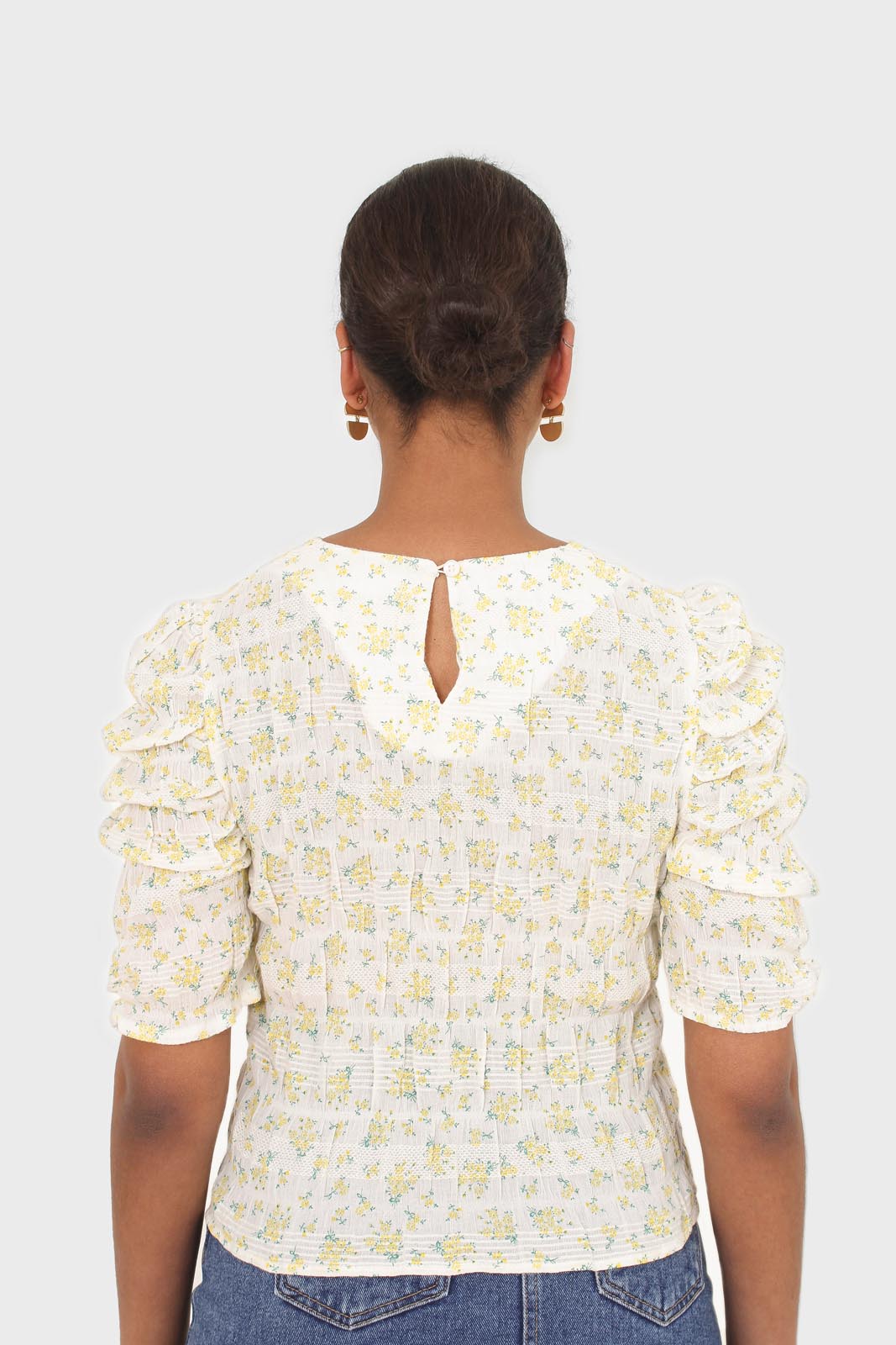 Yellow floral smocked short sleeved blouse