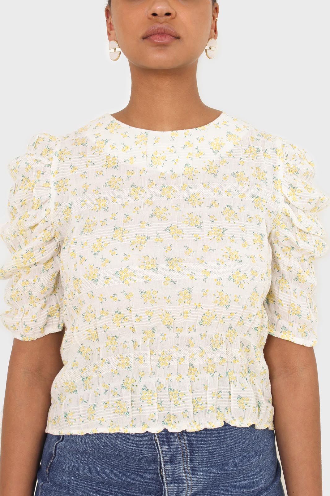 Yellow floral smocked short sleeved blouse