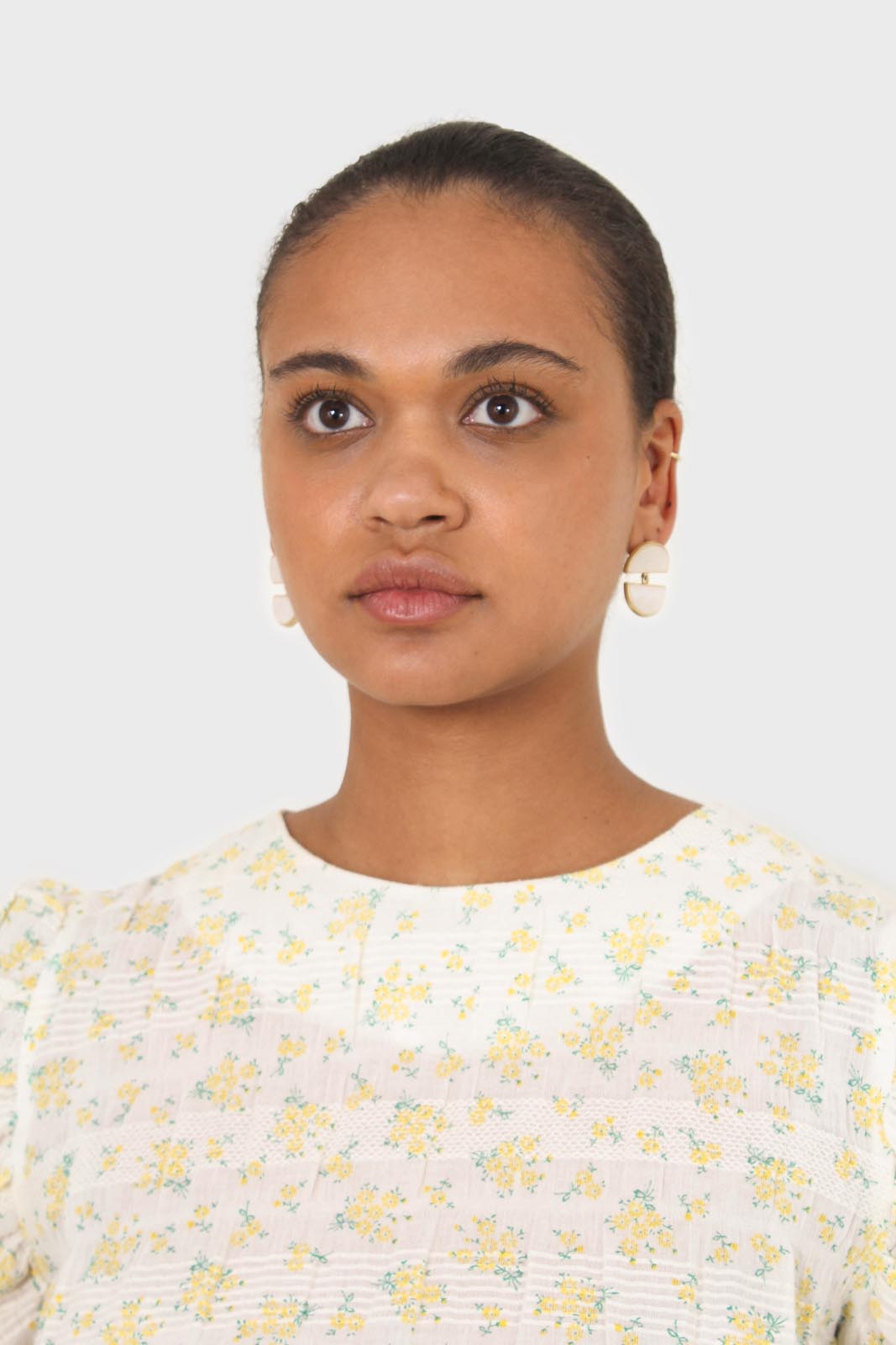 Yellow floral smocked short sleeved blouse