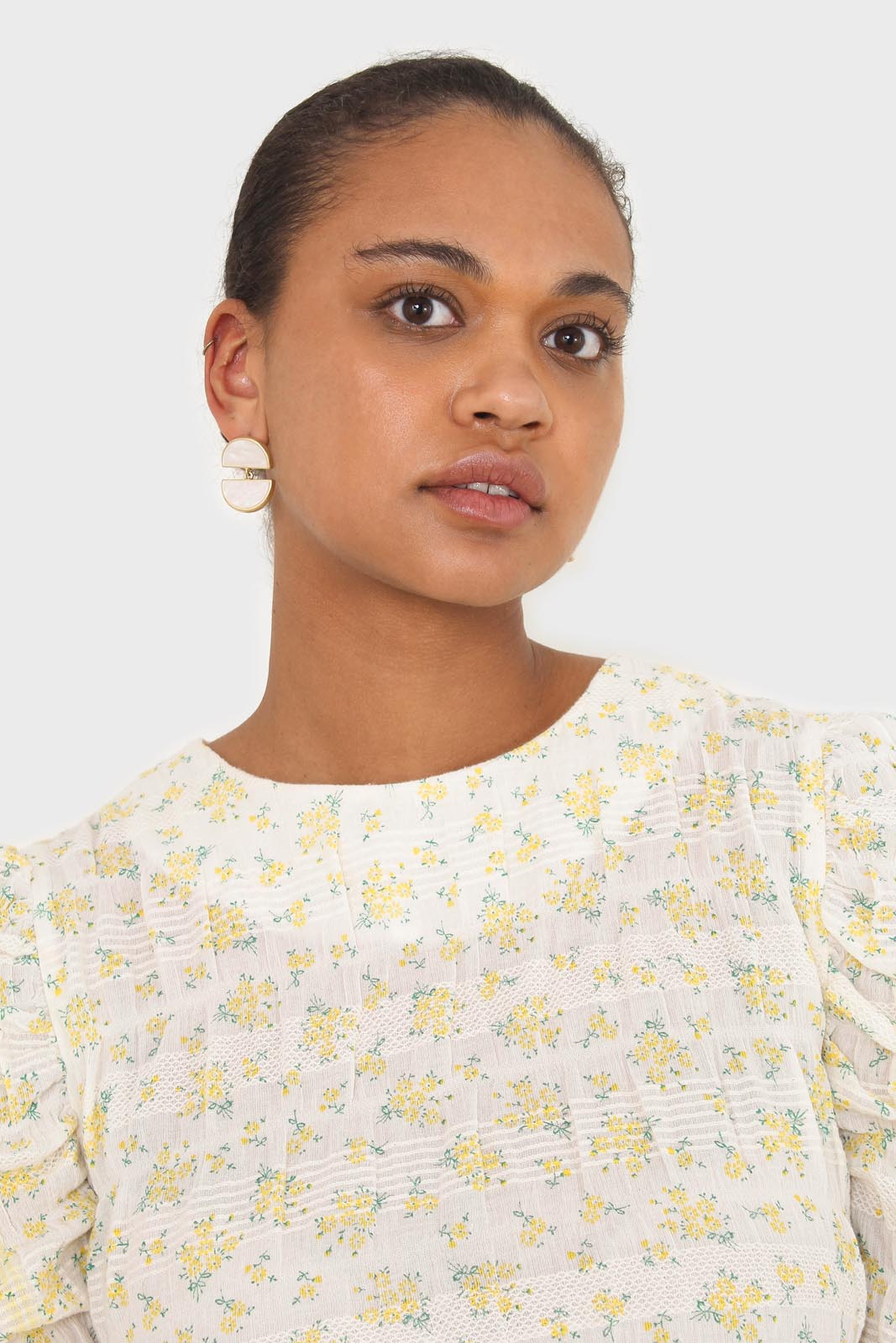 Yellow floral smocked short sleeved blouse