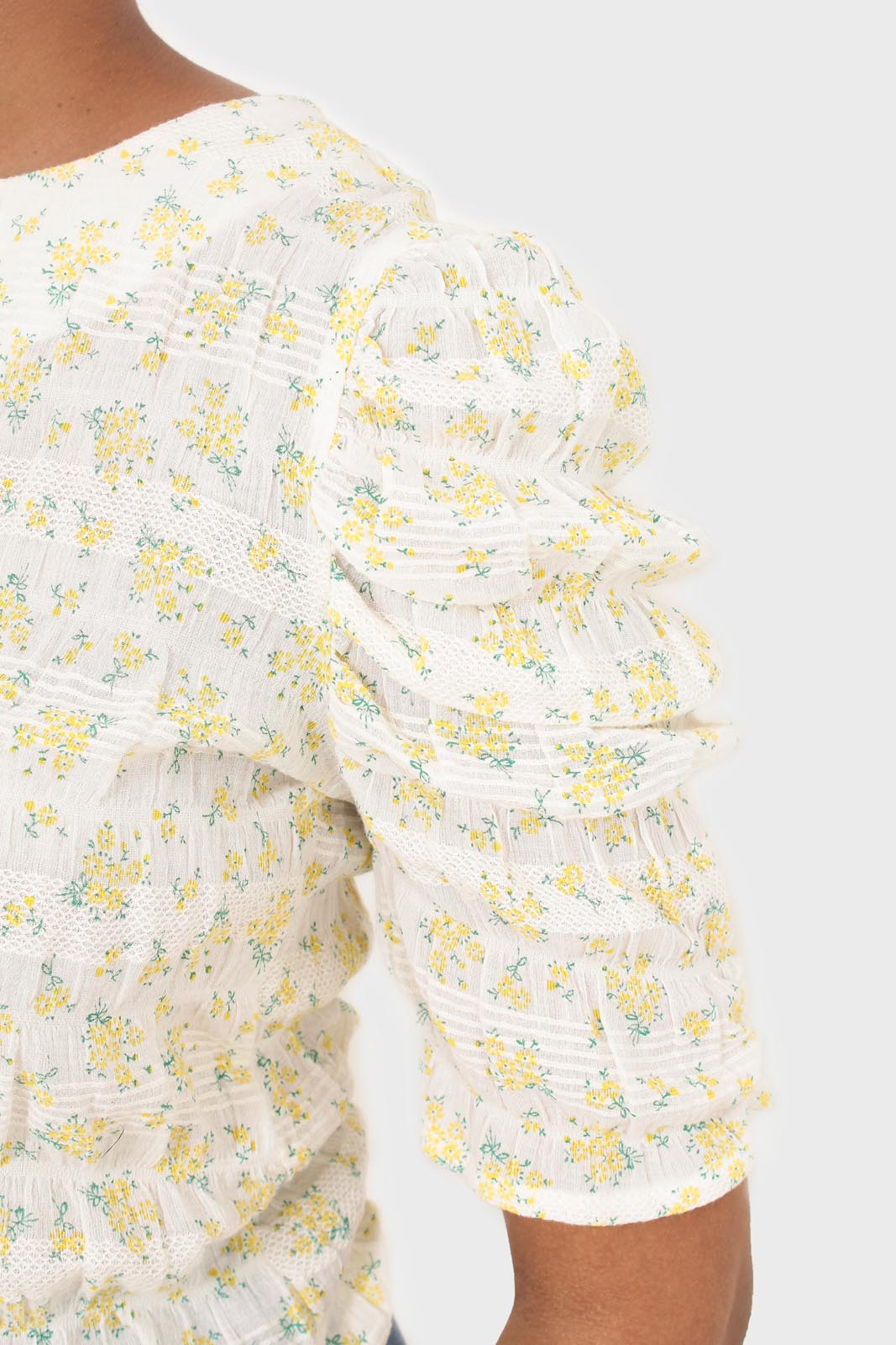 Yellow floral smocked short sleeved blouse
