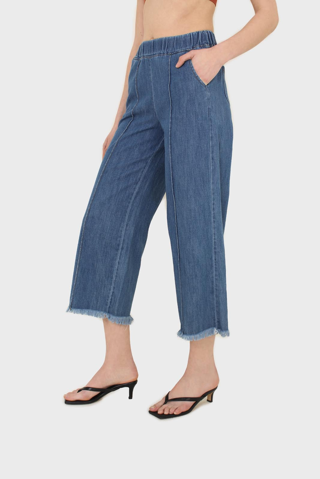 Blue pin tuck raw hem jeans