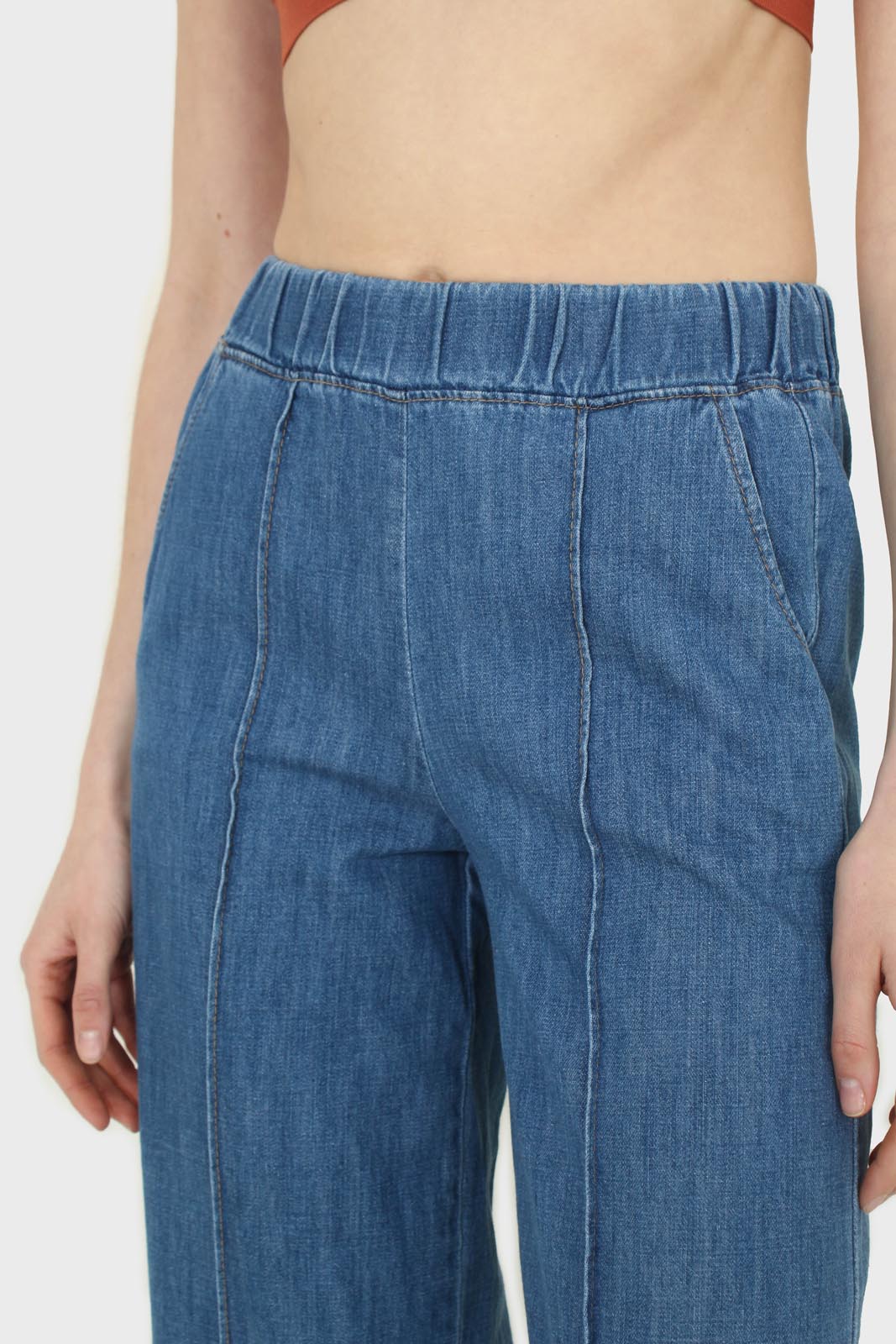 Blue pin tuck raw hem jeans