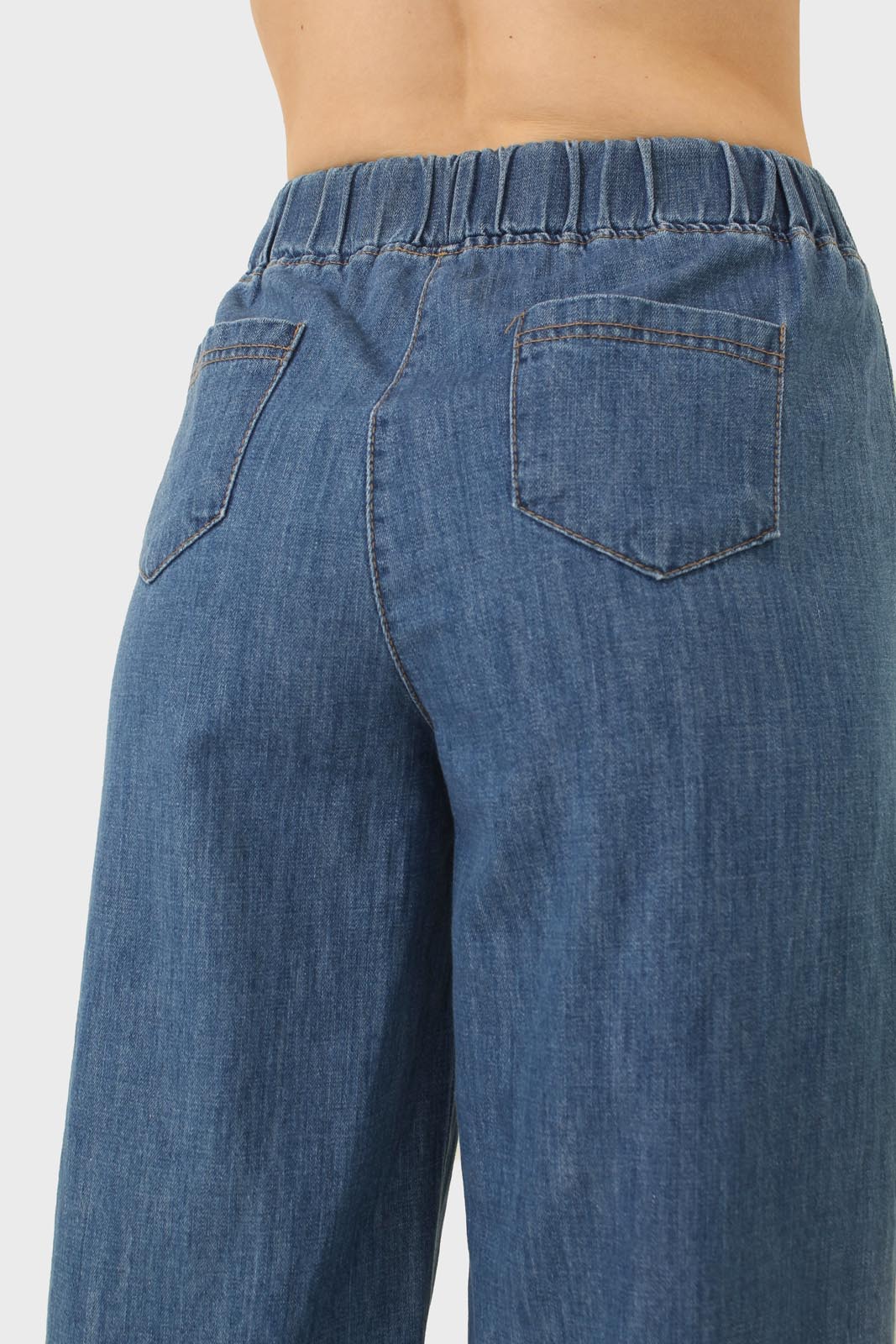 Blue pin tuck raw hem jeans