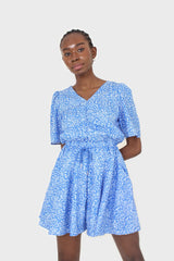Blue and white floral print tie waist romper