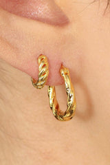 Gold twisted oval huggie earring - 9mm