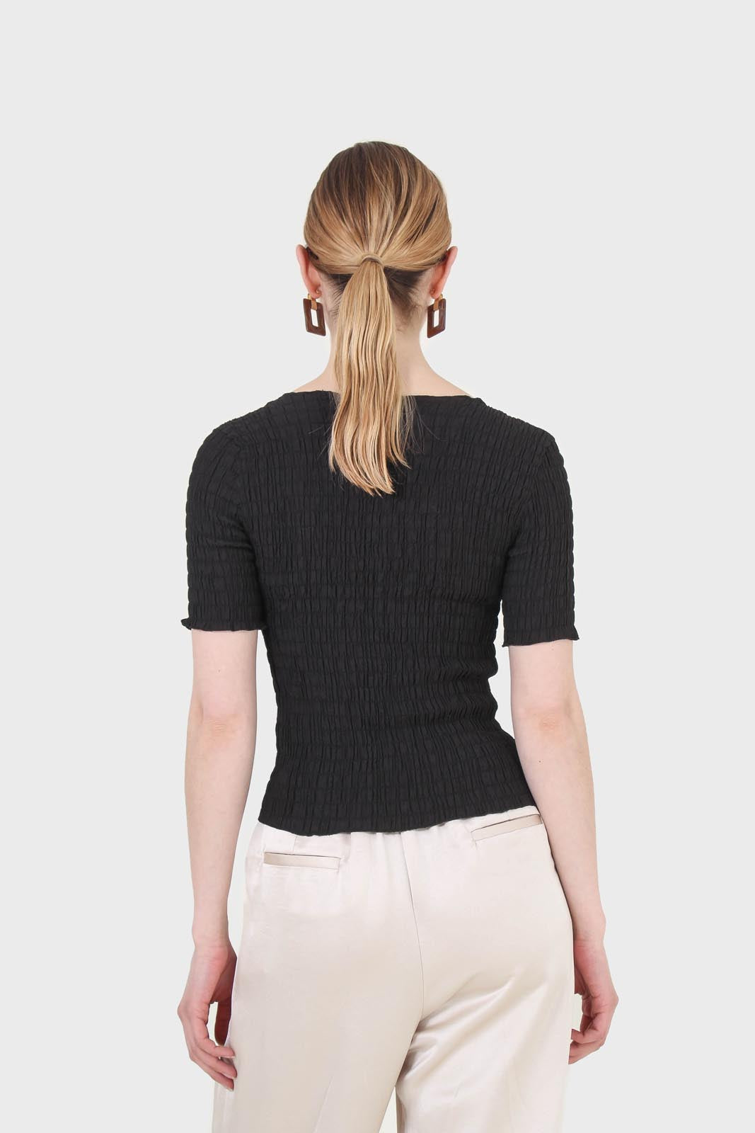 Black smocked fitted short sleeved top