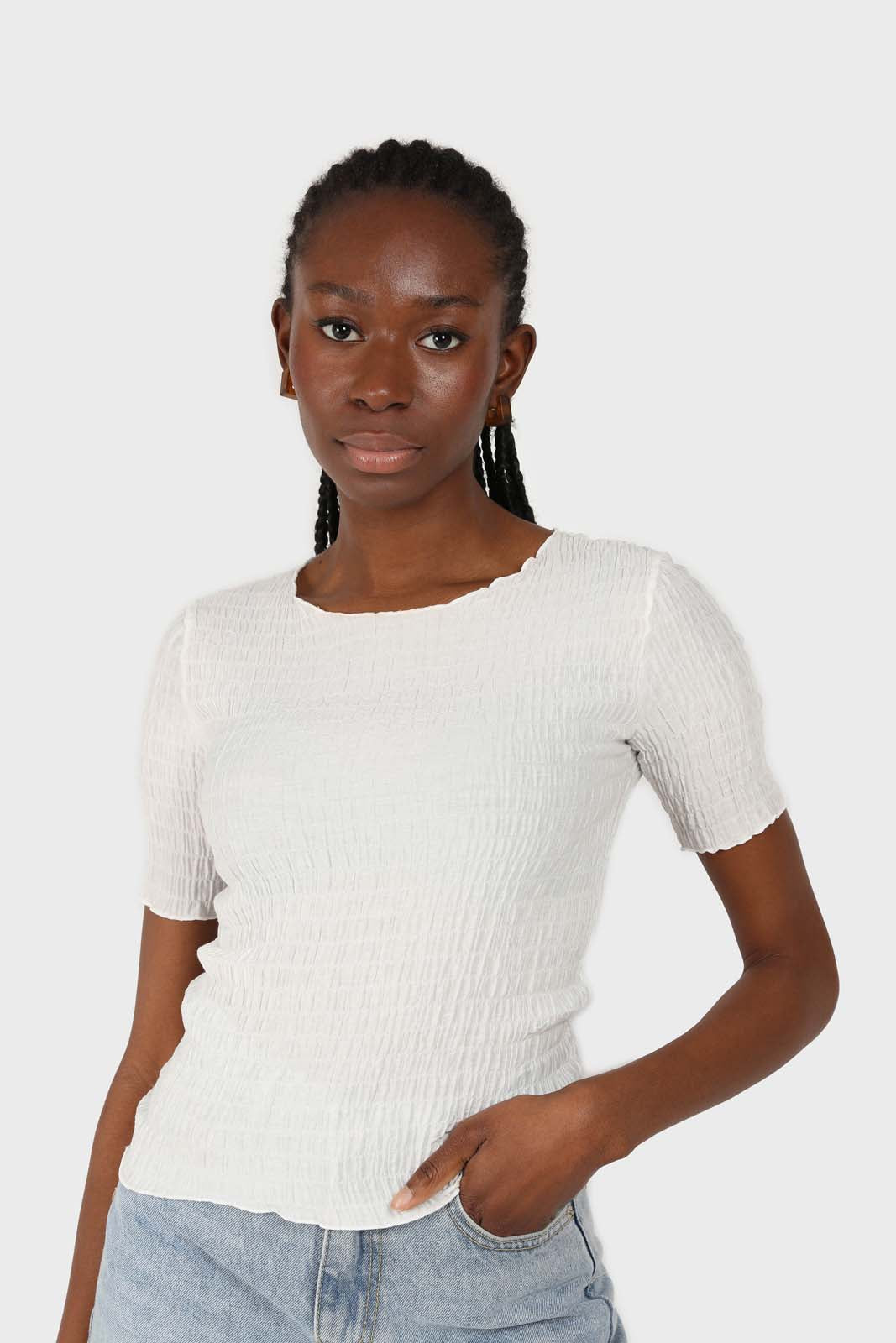 White smocked fitted short sleeved top