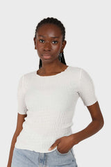 White smocked fitted short sleeved top