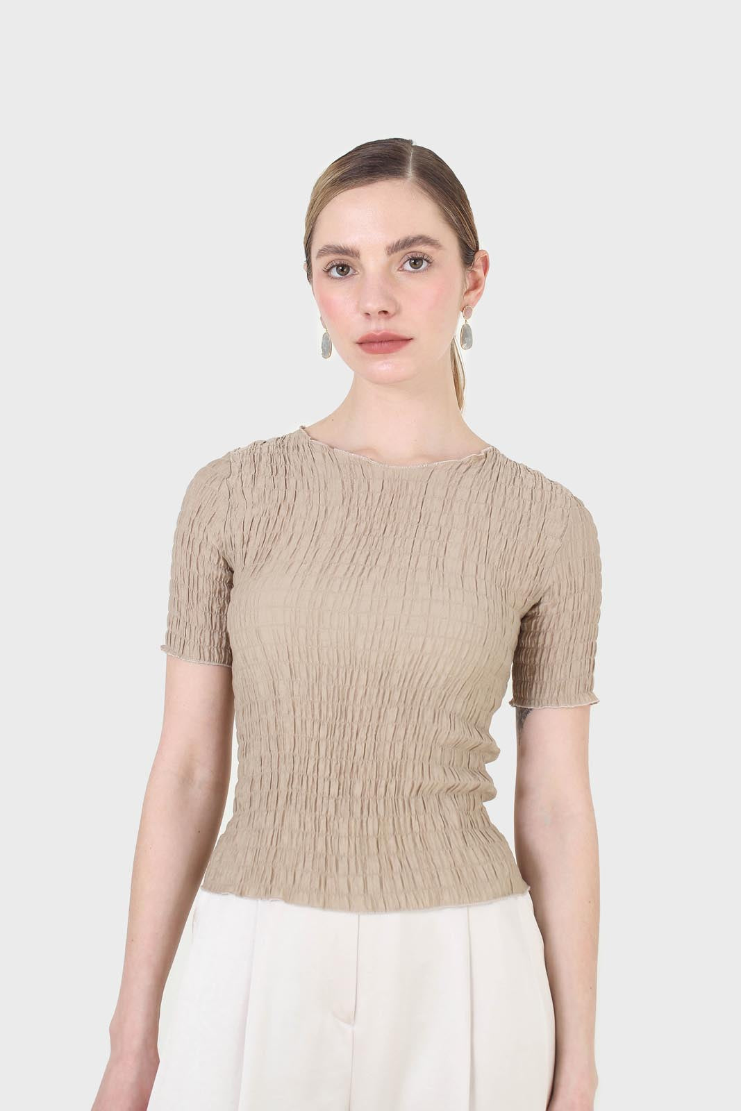Beige smocked fitted short sleeved top