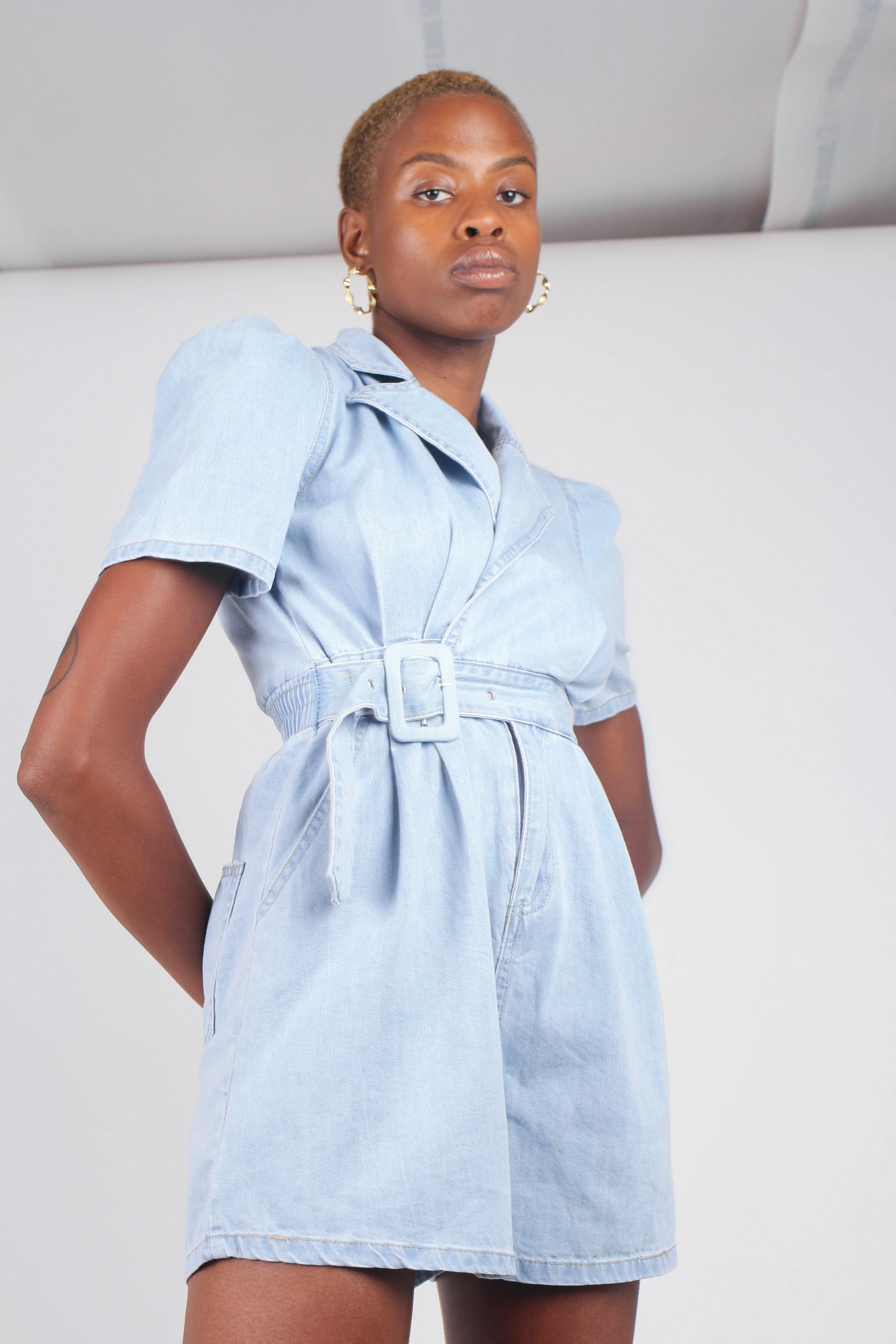 Light blue denim open back romper