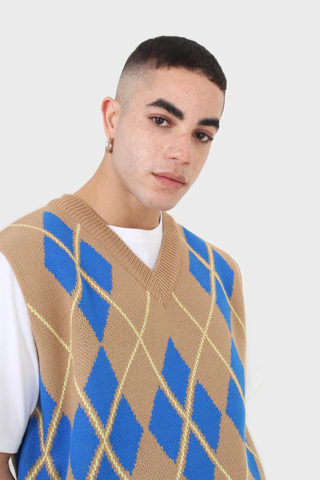Camel and bright blue argyle sweater vest