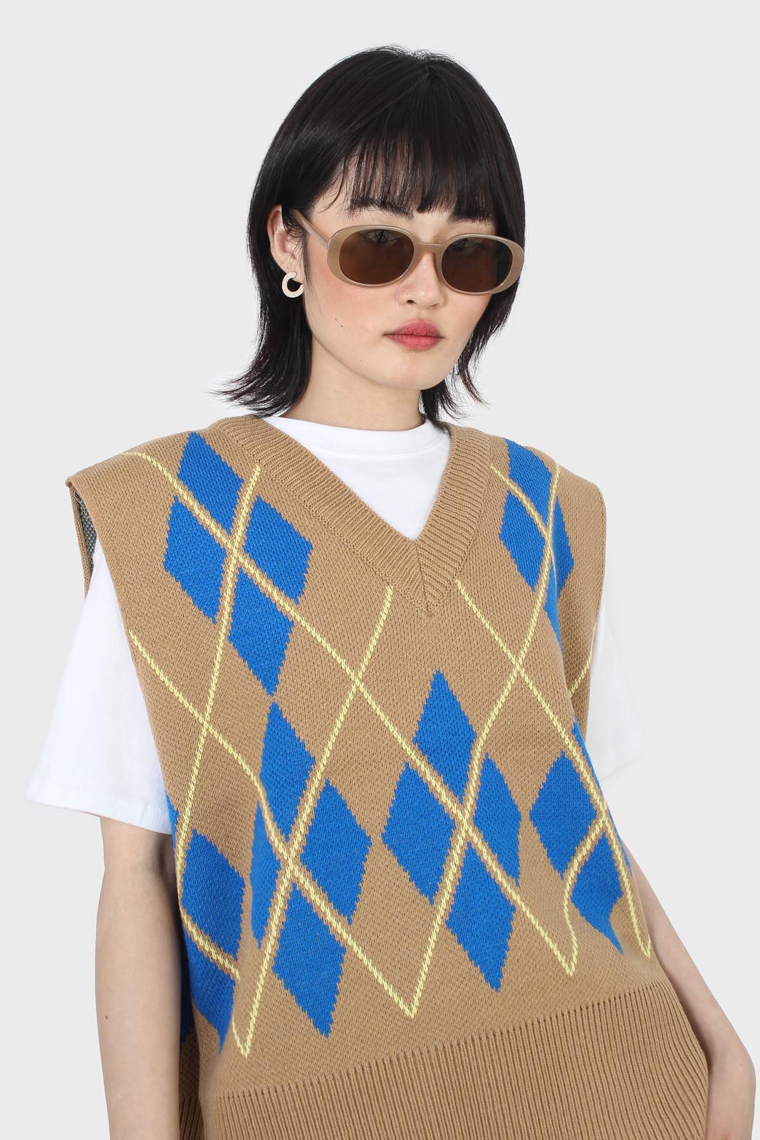 Camel and bright blue argyle sweater vest