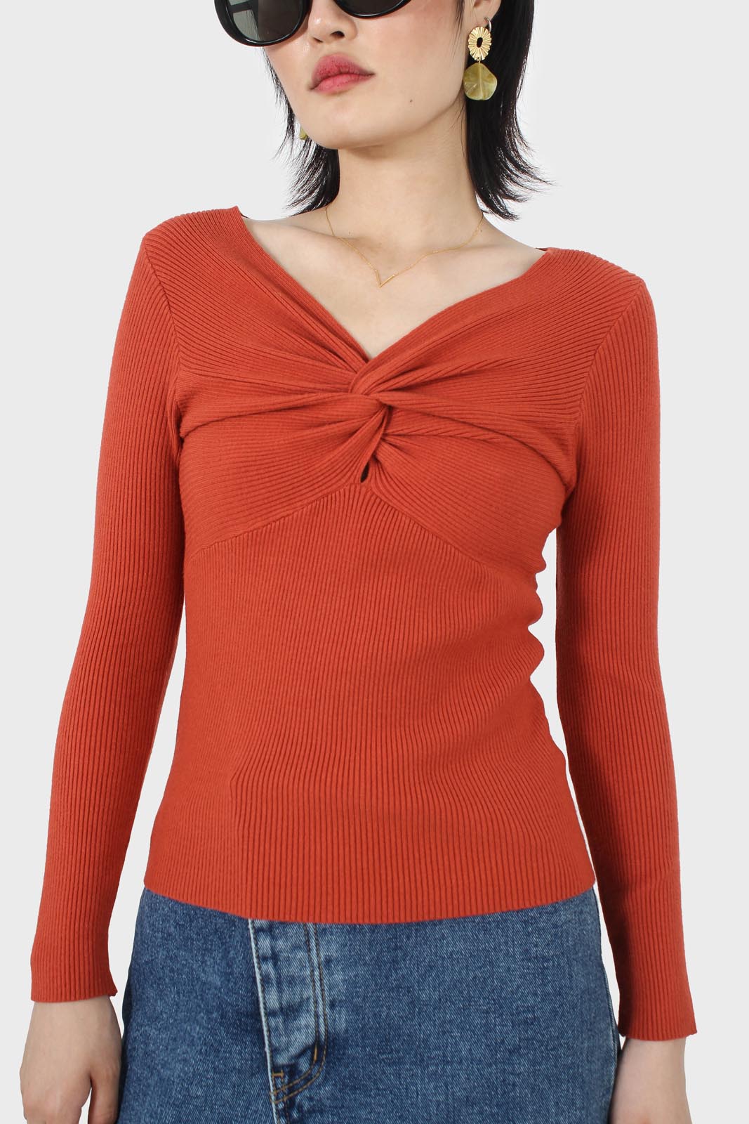 Orange cross front chest knit top