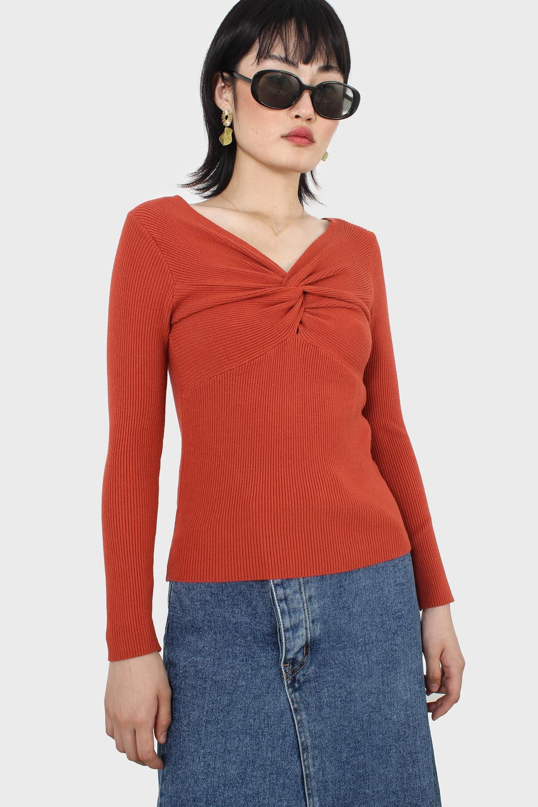 Orange cross front chest knit top