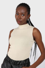 Light beige sleeveless mock neck knit tank