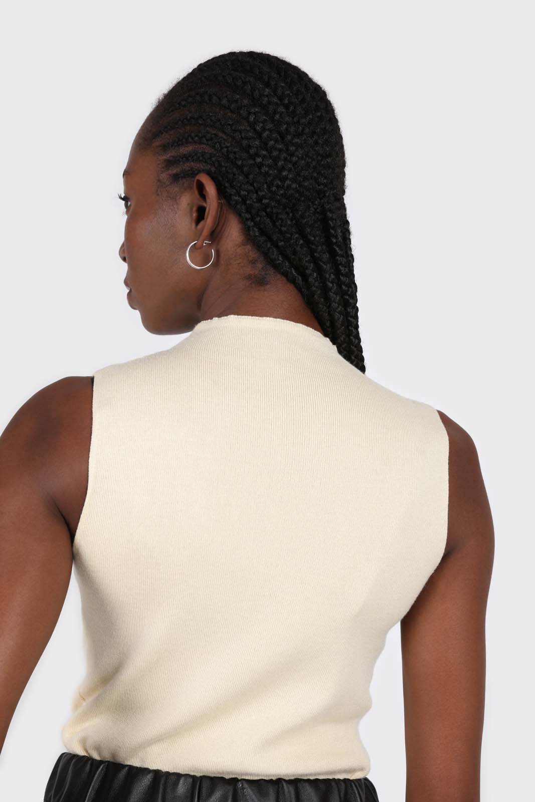 Light beige sleeveless mock neck knit tank