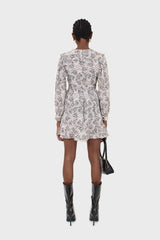 Ivory and black printed ruffle trim dress