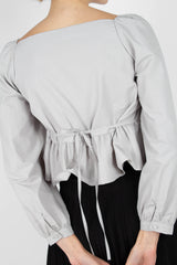 Pale blue off shoulder cinch waist top