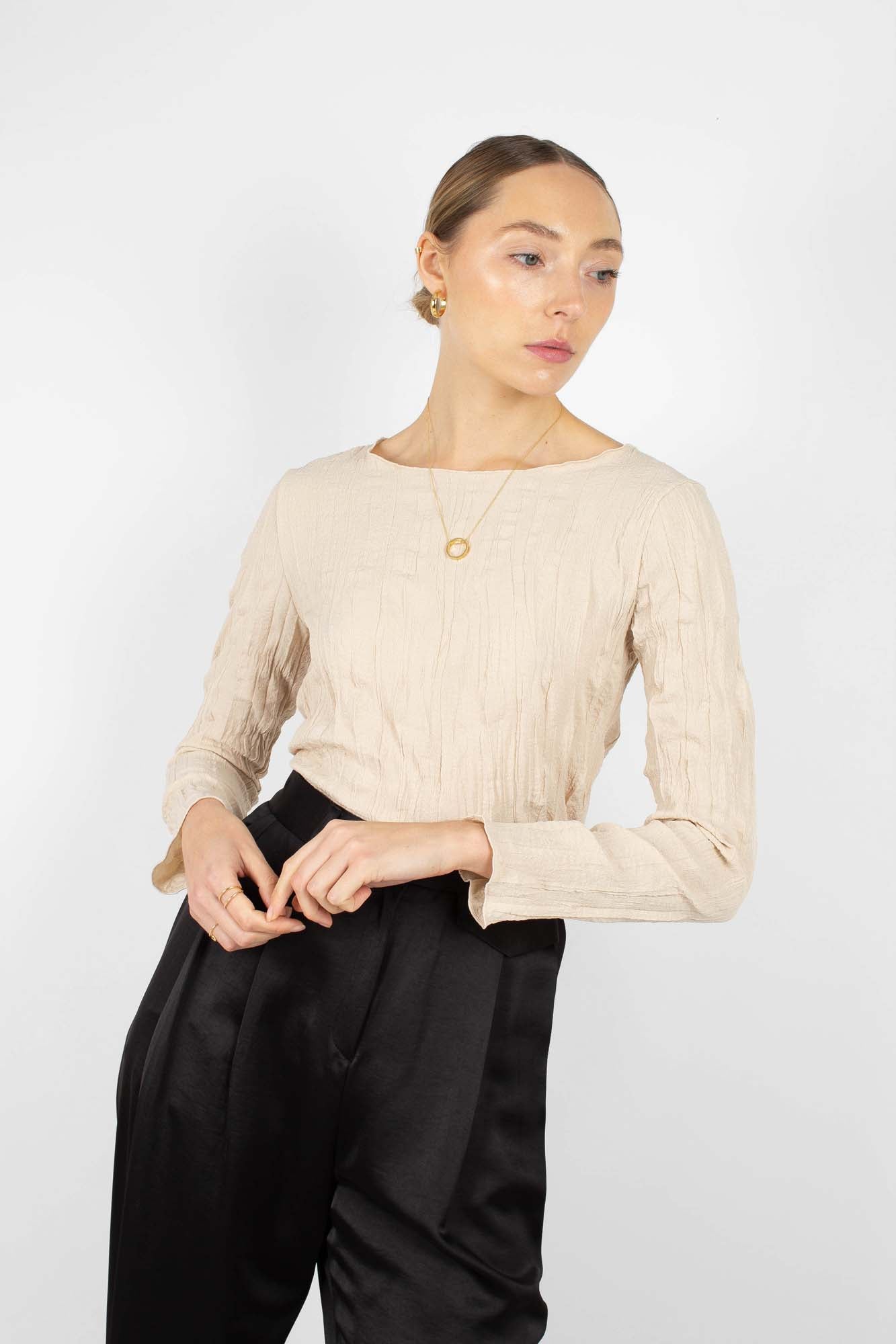 Beige wrinkled long sleeved top