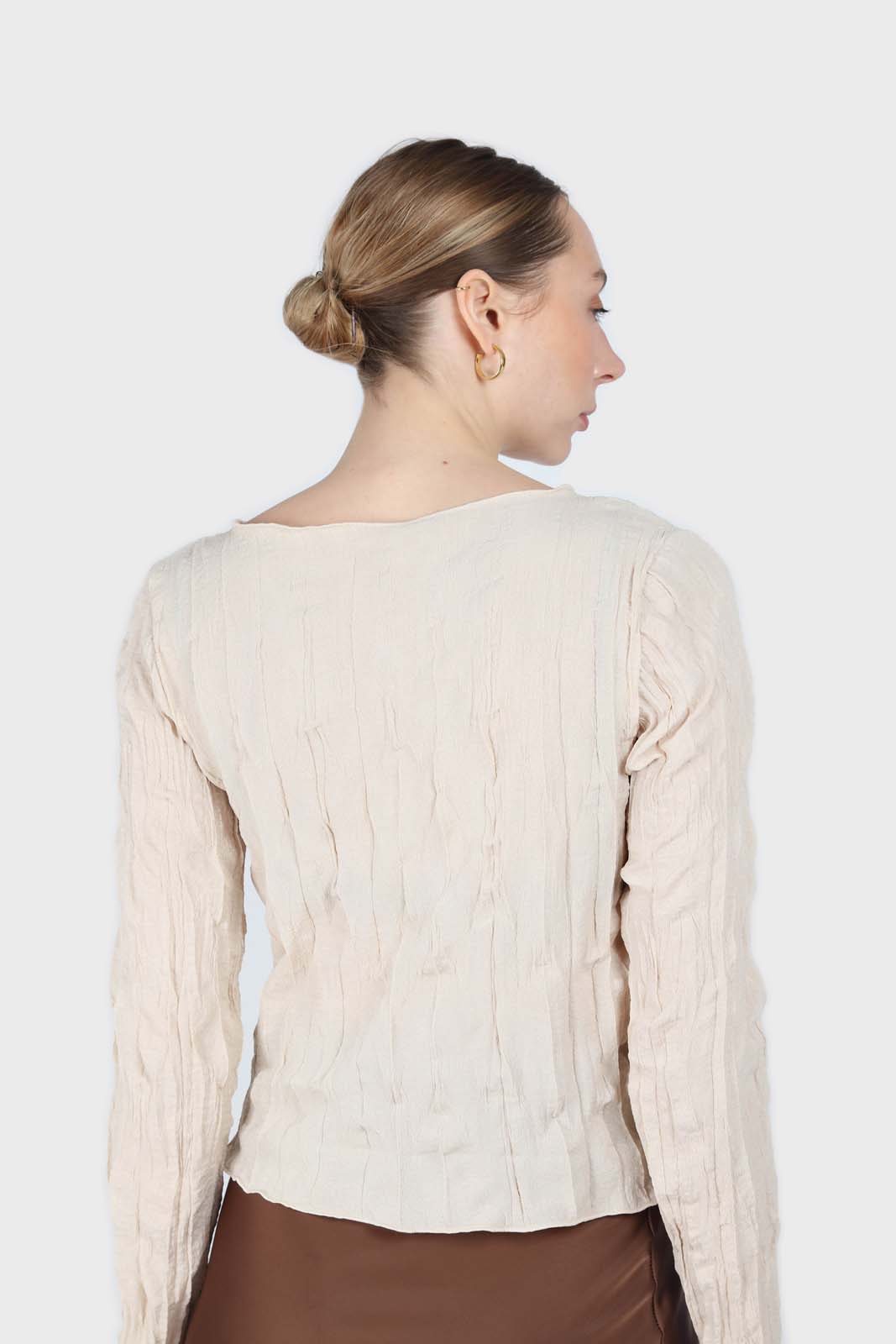 Beige wrinkled long sleeved top