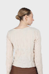 Beige wrinkled long sleeved top