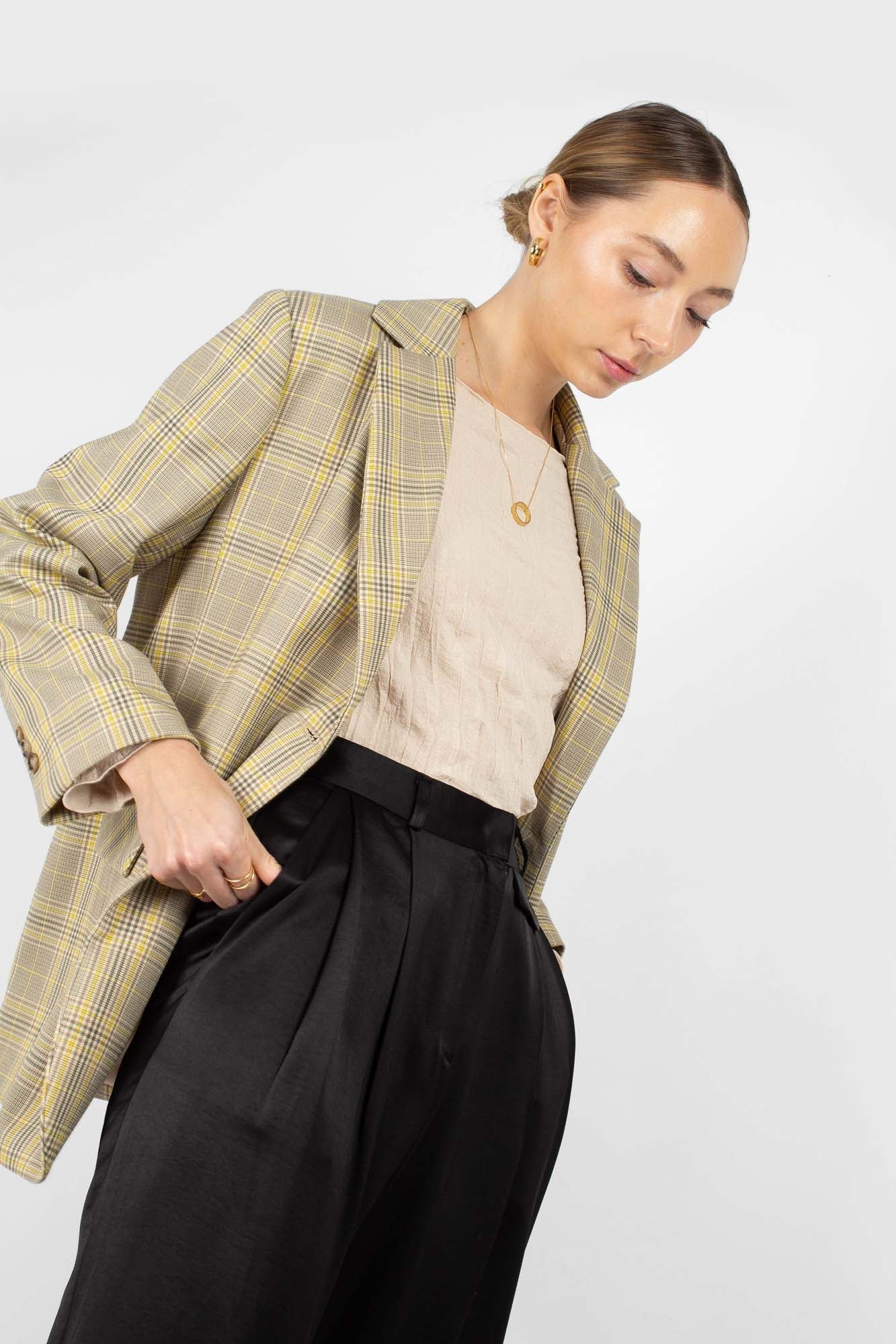 Beige wrinkled long sleeved top