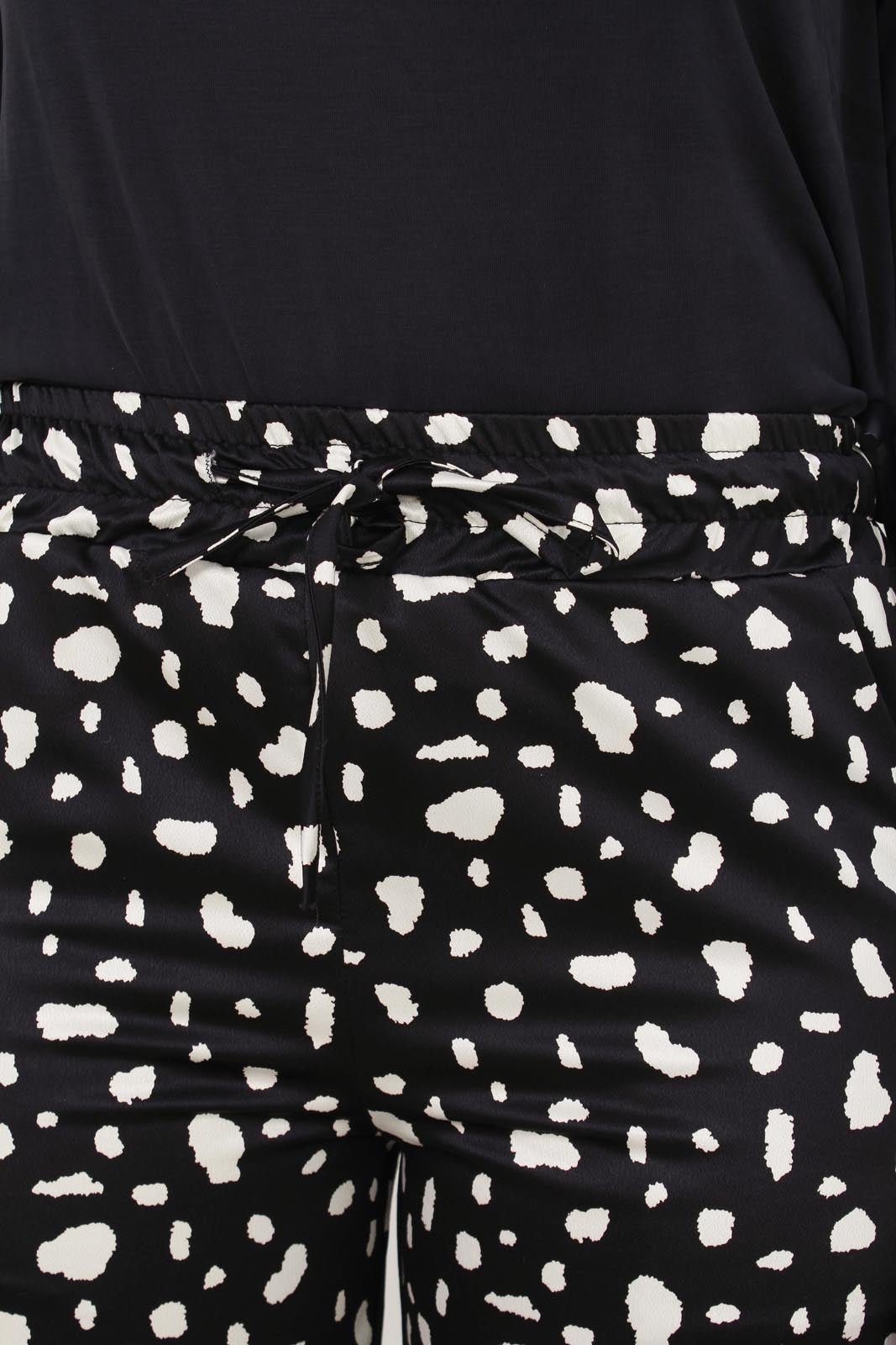 Black and white blotch print satin loose fit trousers