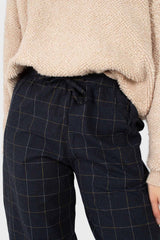Navy and white box checked loose fit trousers