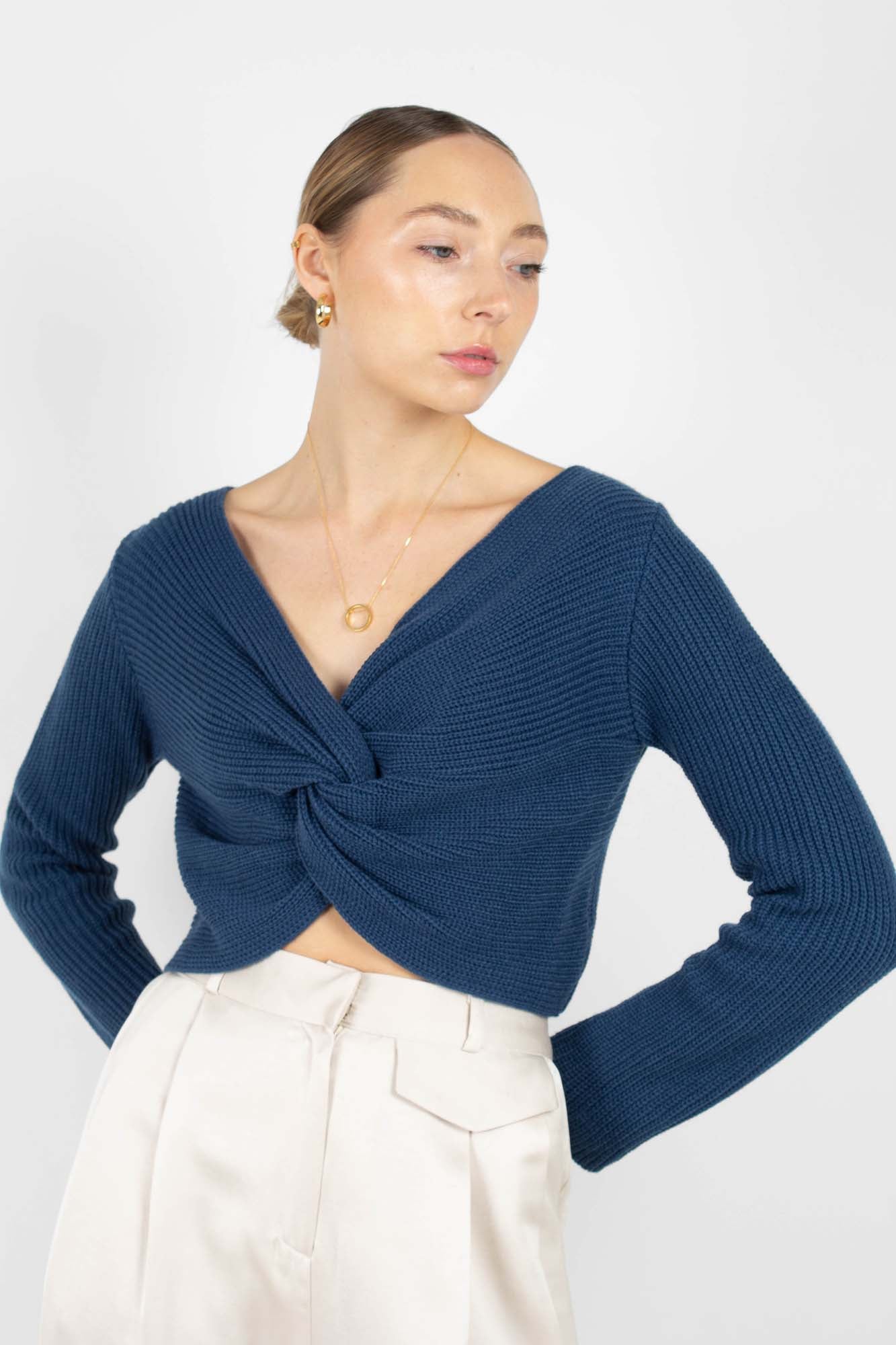 Dark blue twist front cropped knit top