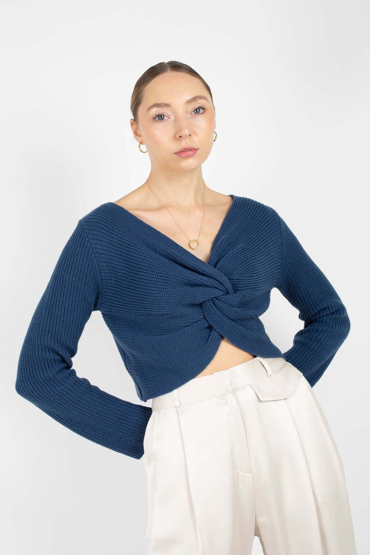 Dark blue twist front cropped knit top