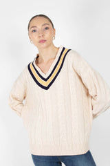 Cream and yellow V-neck cableknit jumper