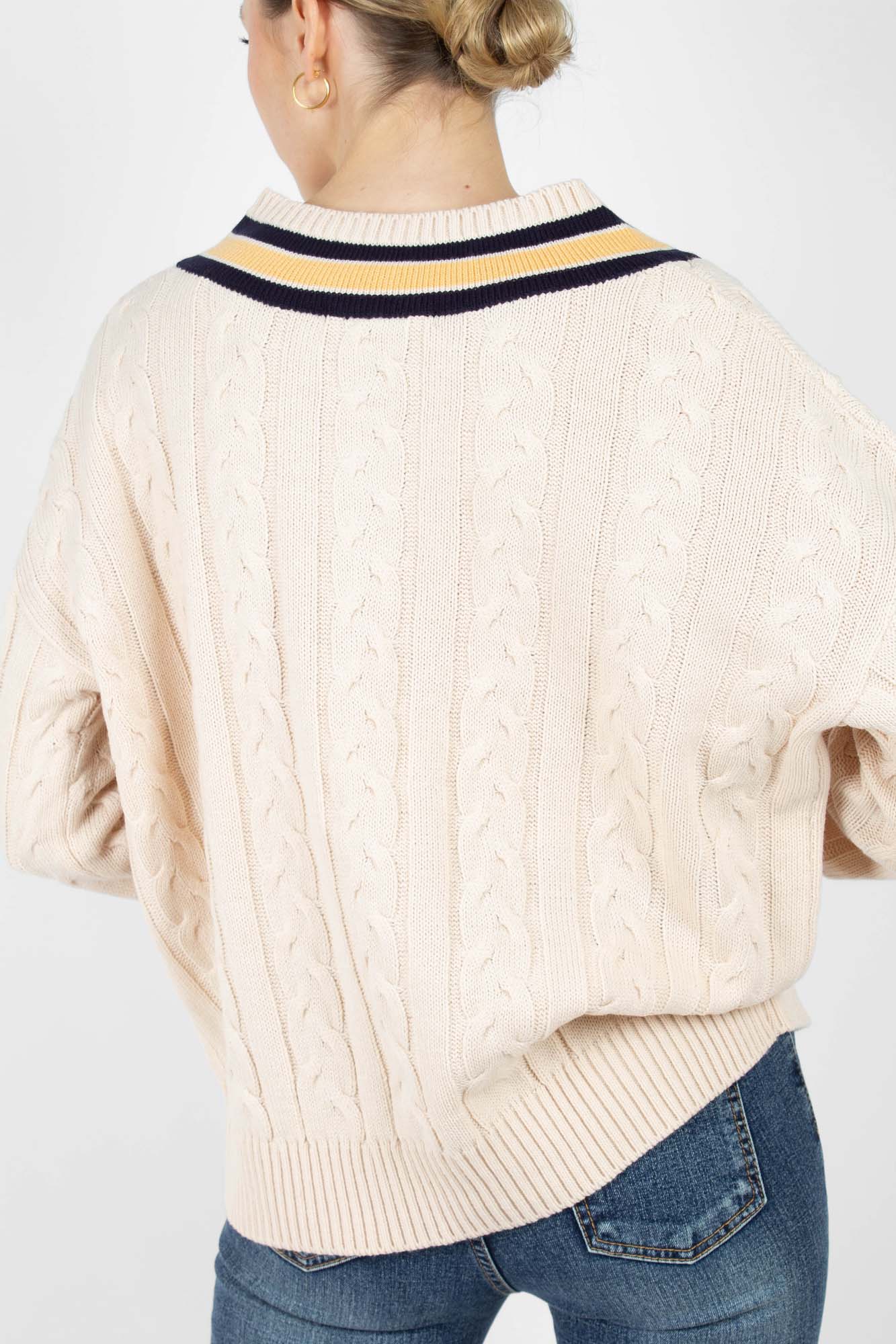 Cream and yellow V-neck cableknit jumper