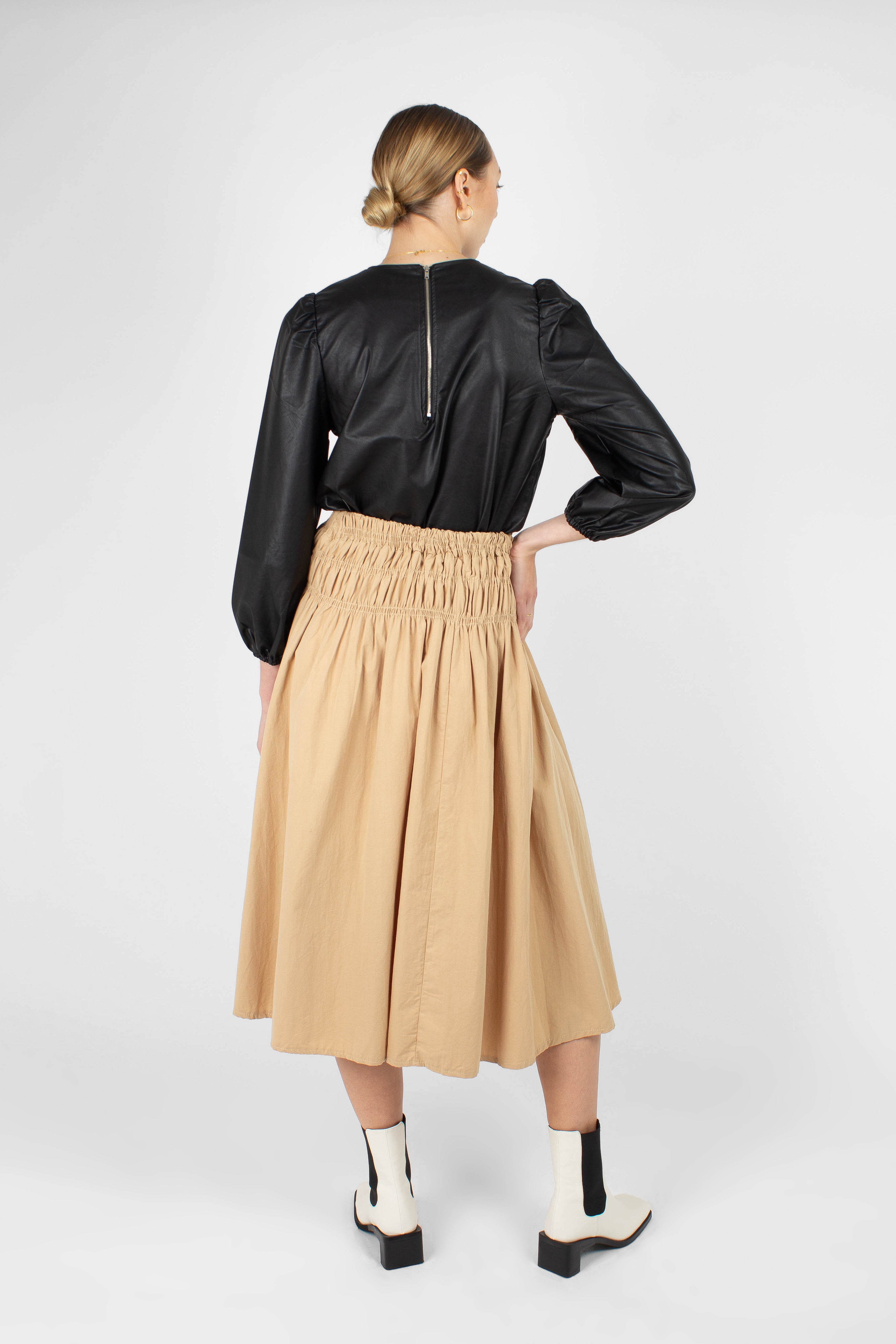 Black glossy faux leather top