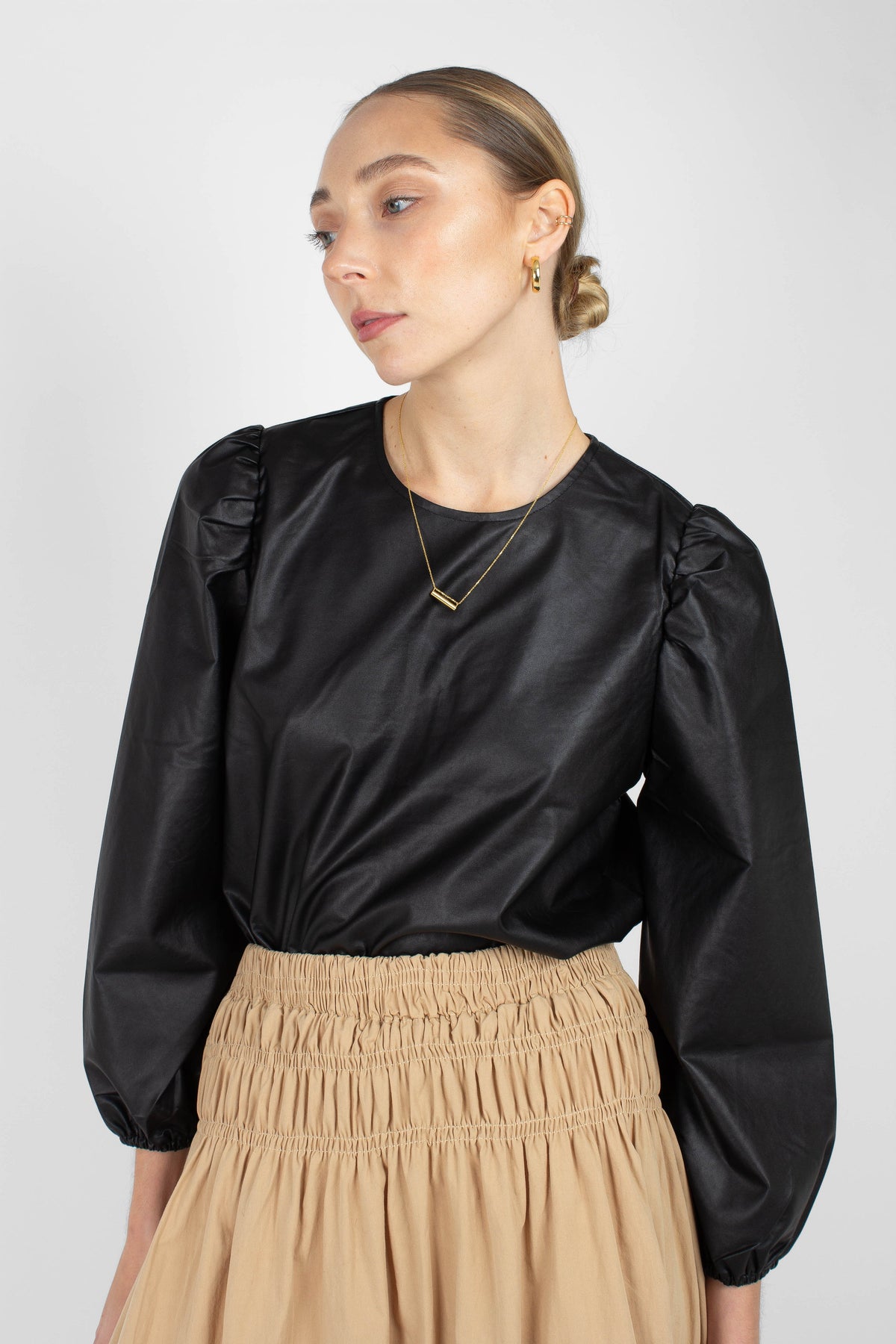 Black glossy faux leather top