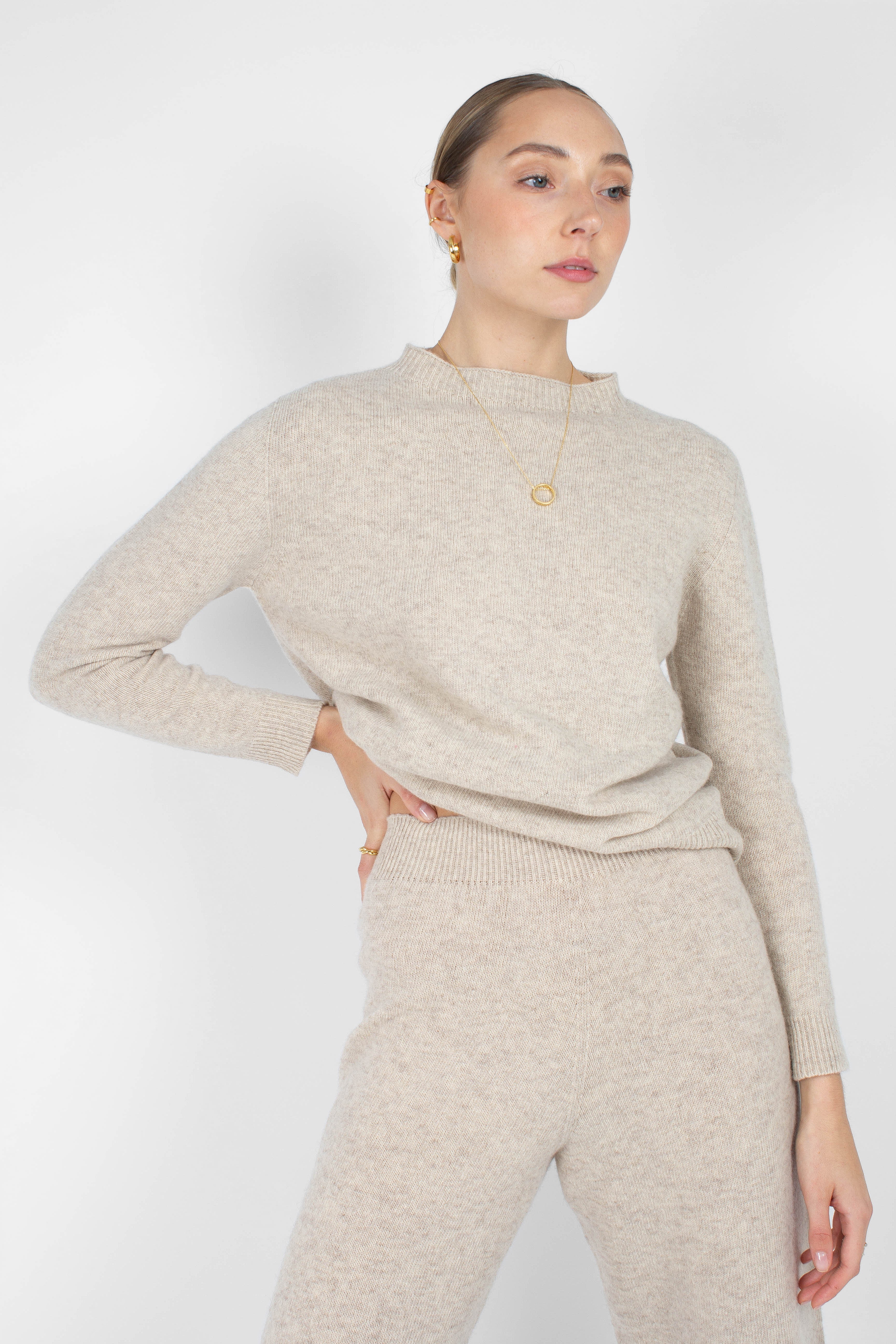 Ivory cashmere wool blend knit trousers