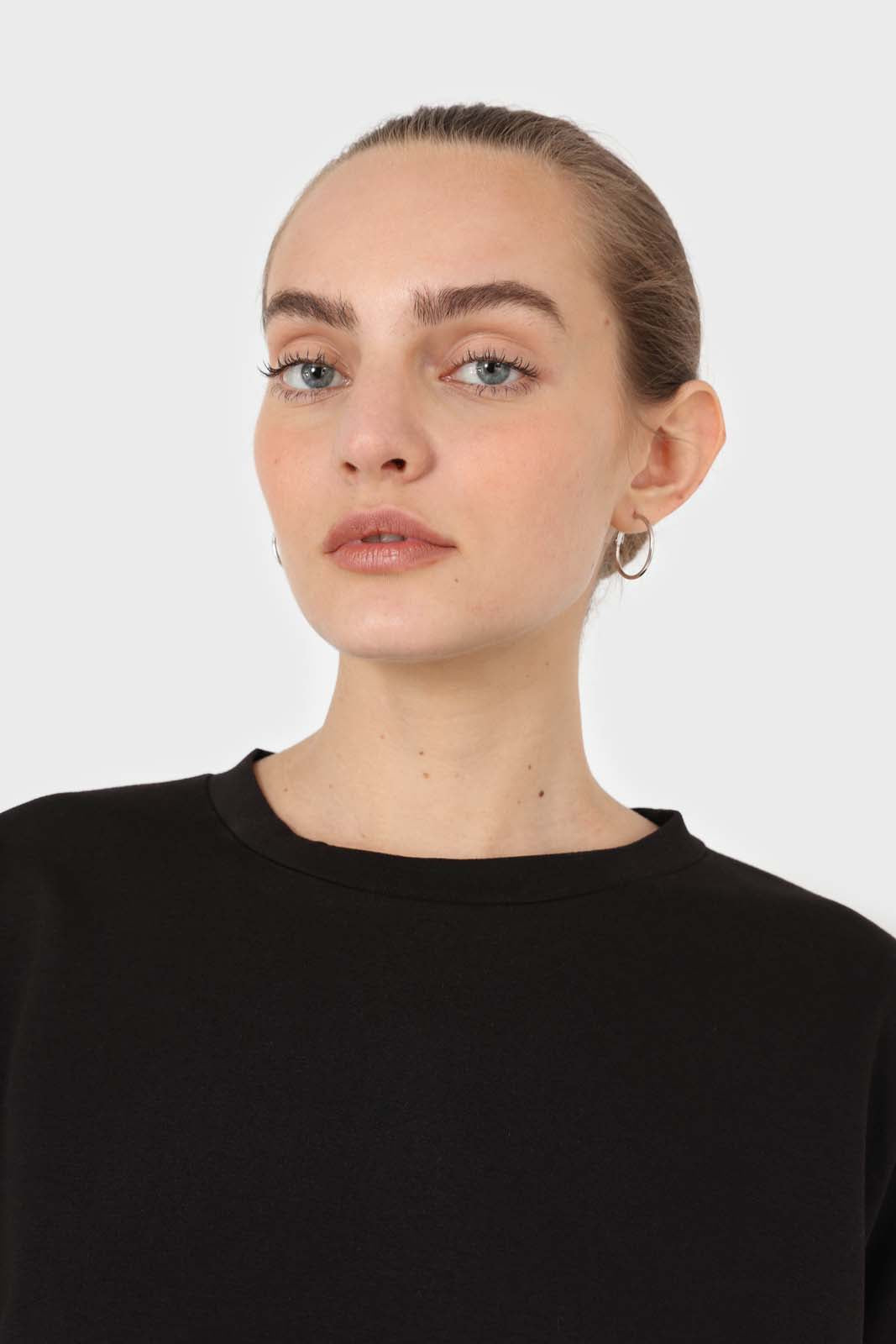 Black vegan leather contrast hem top
