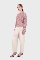 Pale pink cross tuft pattern blouse