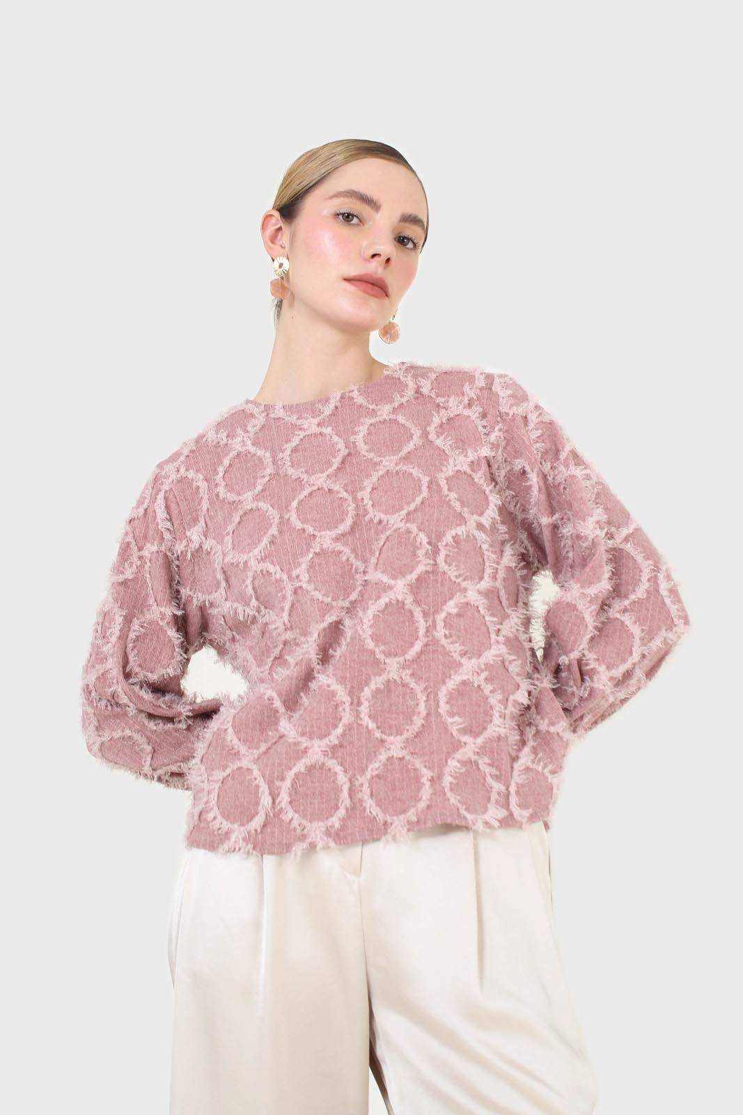 Pale pink cross tuft pattern blouse