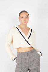 Ivory and black deep V cross front knit top