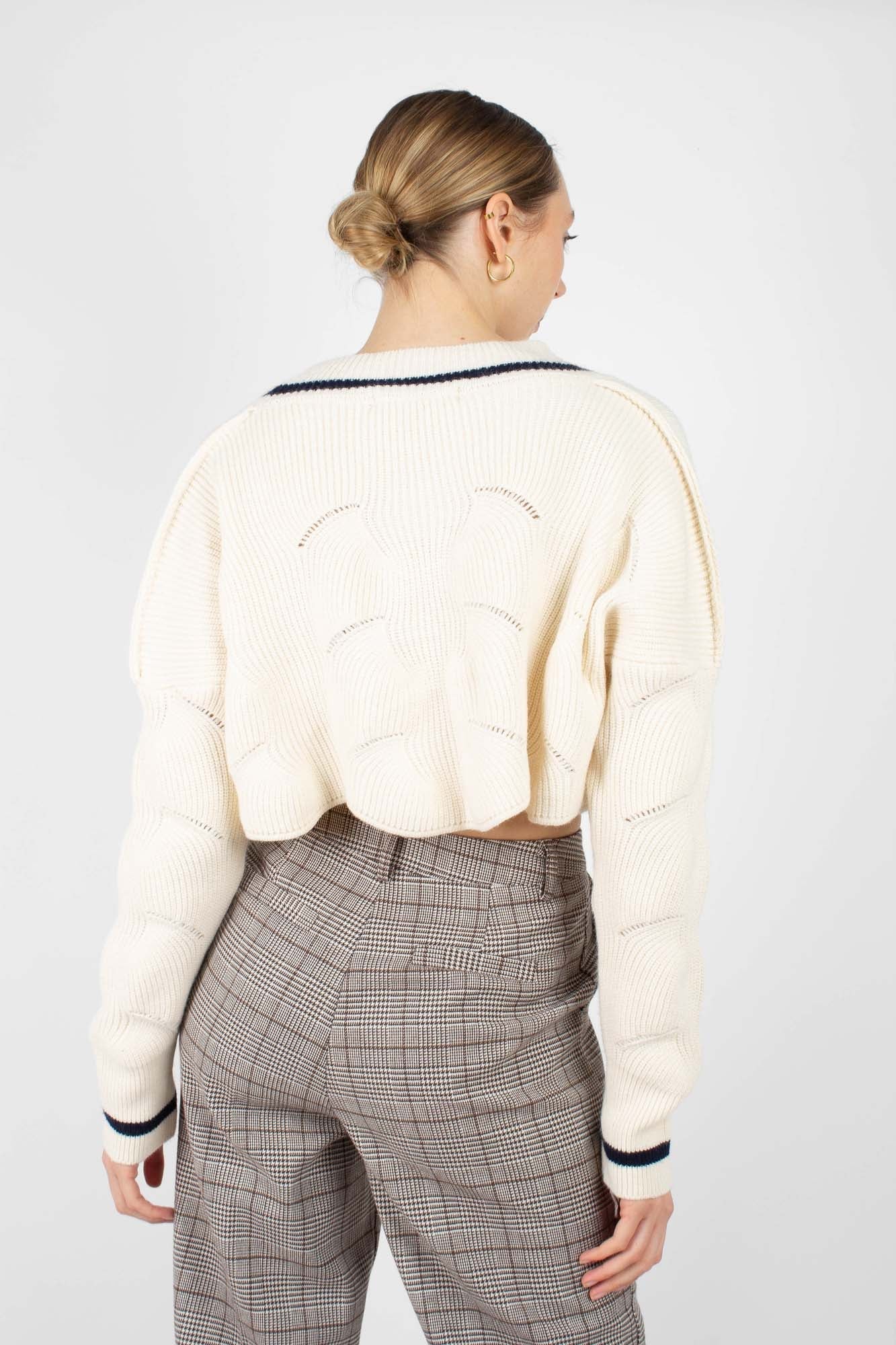 Ivory and black deep V cross front knit top