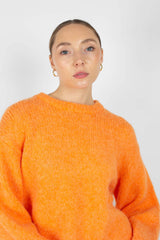 Bright orange crew neck loose fit jumper