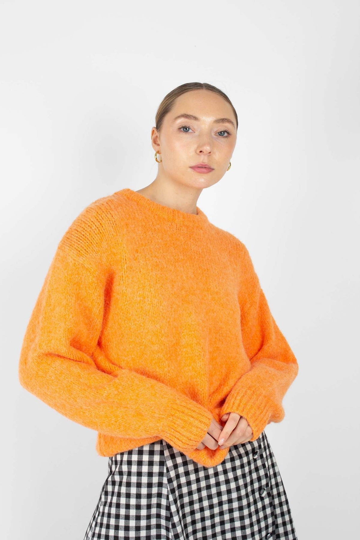 Bright orange crew neck loose fit jumper