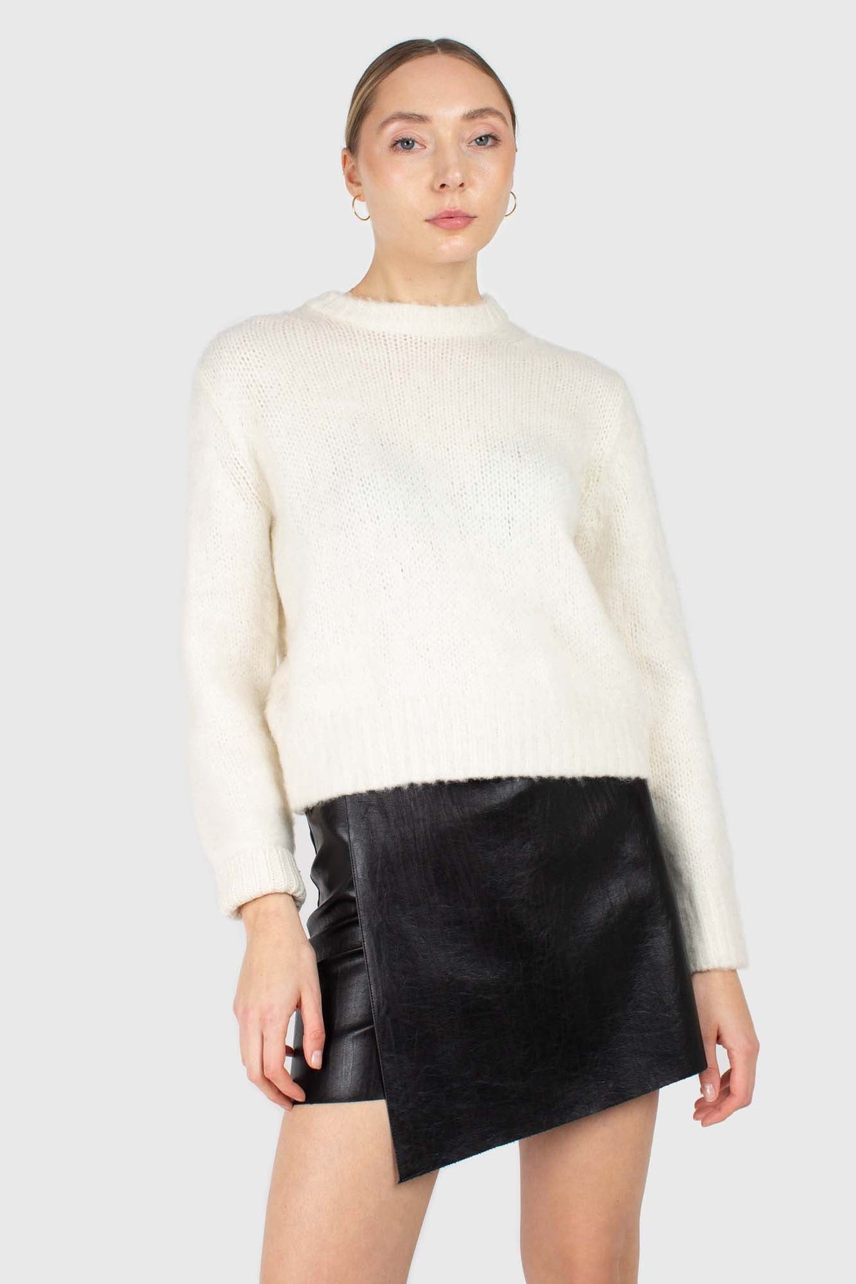 Black vegan leather cross front mini skirt